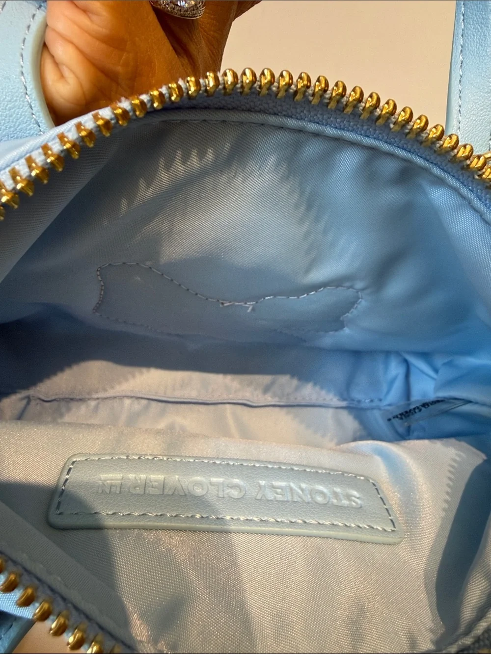 Stoney clover lane crossbody pouchette blue